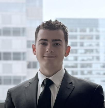 Headshot of Dylan Flynn in professional attire